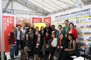 The delegation representing The New School's Global Urban Future Project in front of their booth at the Habitat III Conference in Quito, Ecuador